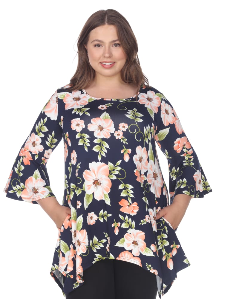 Front of a model wearing a size 1X Blanche Tunic Top in Peach Flower by White Mark. | dia_product_style_image_id:257636